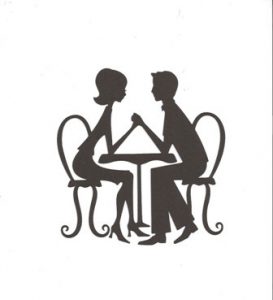 Couple sitting at table silhouette